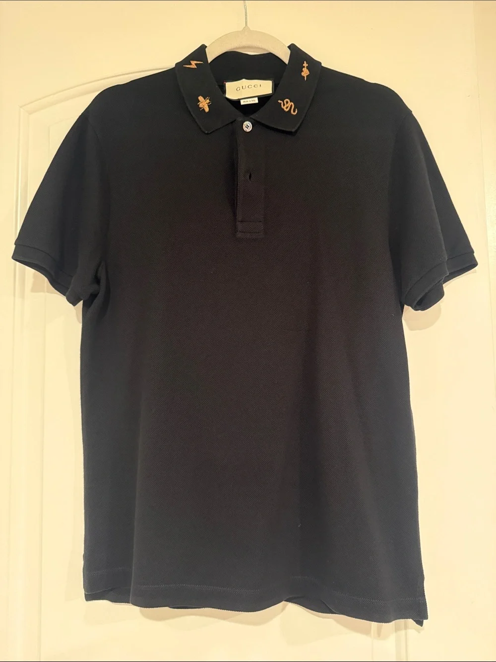 Gucci Black Polo with Gold Embroidered Collar Motifs